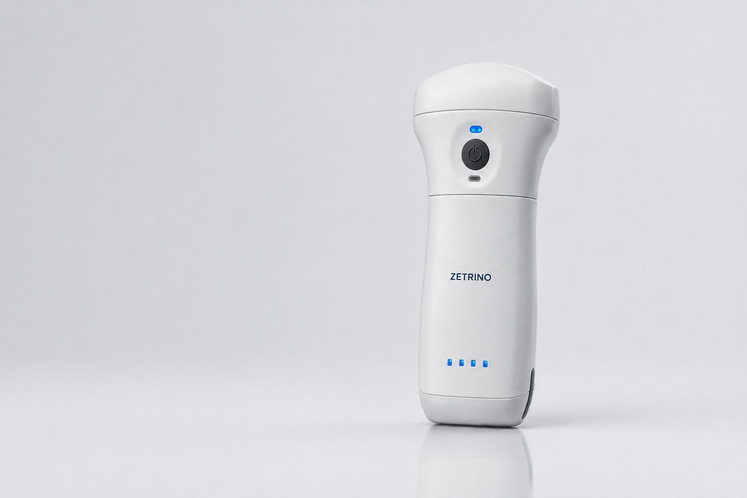 Wireless ultrasound probe shown on a clean technical studio background